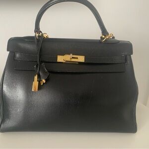 Black box Hermes kelly 28 cm with top handle and lock